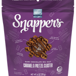 Snappers dark chocolate sea salt caramel pretzel cluster packaging on a white background