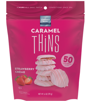 Pink package of Caramel Thins Strawberry Creme on a white background